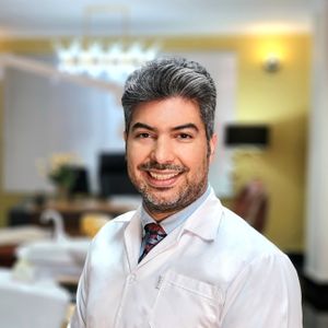 نیما نیک افشار تخصص بیماری‌های دهان